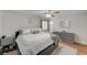 Spacious main bedroom featuring wood-look floors and neutral color palette at 713 Salt Flats Cir, Henderson, NV 89011