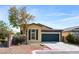 Charming single-story home featuring a two-car garage and a well-maintained front yard with desert landscaping at 7348 Zion Falls St, Las Vegas, NV 89131