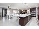 Open-concept kitchen with granite countertops, stainless steel appliances, and a spacious island at 7525 Campbell Ranch Ave, Las Vegas, NV 89179