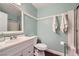 Light and airy bathroom with a shower/tub combination and modern white fixtures at 7636 Sudan Ct, Las Vegas, NV 89149