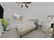 Bedroom featuring a plush bed, side table, and neutral color palette at 788 Grand Country Ave, North Las Vegas, NV 89086