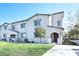 Charming two-story townhouse featuring a well-manicured lawn and inviting entrance at 788 Grand Country Ave, North Las Vegas, NV 89086