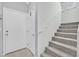 Hallway and staircase leading to the home's upper level at 788 Grand Country Ave, North Las Vegas, NV 89086