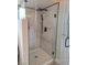 Bathroom featuring a modern shower with a sleek black fixture and glass door at 8504 Soneto Ln, Las Vegas, NV 89117