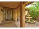 Charming courtyard featuring a decorative water fountain and ambient string lights for a cozy atmosphere at 8504 Soneto Ln, Las Vegas, NV 89117