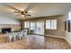 Open dining room with a brick fireplace, tile floors, and plenty of natural light at 8504 Soneto Ln, Las Vegas, NV 89117
