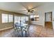 Inviting dining area featuring tile flooring and views to the kitchen at 8504 Soneto Ln, Las Vegas, NV 89117