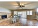 Open dining room with a brick fireplace, tile floors, and plenty of natural light at 8504 Soneto Ln, Las Vegas, NV 89117