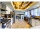 Lovely kitchen featuring white cabinets, stainless steel appliances, and views to the Gathering room at 8504 Soneto Ln, Las Vegas, NV 89117