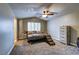 Spacious bedroom with a neutral color scheme, vaulted ceiling, and ample closet space at 8504 Soneto Ln, Las Vegas, NV 89117
