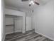 Comfortable bedroom featuring closet space, neutral paint and wood floors at 8805 Jeffreys St # 1018, Las Vegas, NV 89123