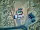 Aerial view of the home, outbuildings, pool and desert landscaping at 881 W Kathryn Ave, Pahrump, NV 89060