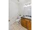 Half-bath features tile flooring, granite countertops, and vanity at 881 W Kathryn Ave, Pahrump, NV 89060