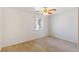 Neutral bedroom featuring a ceiling fan and bright natural light at 881 W Kathryn Ave, Pahrump, NV 89060