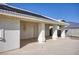 Covered patio with supporting columns leading to the outdoor pool and backyard at 881 W Kathryn Ave, Pahrump, NV 89060