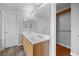 Spacious bathroom with double vanity, tub and shower, and ample lighting at 9107 Wine Cellar Ave, Las Vegas, NV 89148