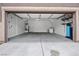 Spacious two-car garage with ample storage space and concrete floors at 9107 Wine Cellar Ave, Las Vegas, NV 89148