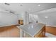 Spacious open-concept space with a kitchen featuring an eat-in bar area at 9107 Wine Cellar Ave, Las Vegas, NV 89148