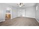 Spacious main bedroom with carpeted floors adjacent to the ensuite bathroom at 9107 Wine Cellar Ave, Las Vegas, NV 89148