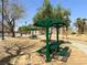Community park featuring shaded picnic tables, walking paths, and mature landscaping creating a welcoming outdoor space at 9322 Straw Hays St # 101, Las Vegas, NV 89178