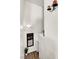 Bright stairway with modern wood laminate flooring and white walls at 9322 Straw Hays St # 101, Las Vegas, NV 89178