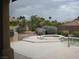 Backyard features a spa, patio and desert landscaping at 10112 Plomosa Pl, Las Vegas, NV 89134