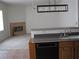 Modern kitchen featuring stainless steel appliances and a pass-through to the living area at 10112 Plomosa Pl, Las Vegas, NV 89134