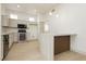 Well-lit kitchen featuring stainless steel appliances and ample counter space at 10309 Georgetown Pl, Las Vegas, NV 89134