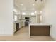 Modern kitchen with stainless steel appliances and a breakfast bar at 10309 Georgetown Pl, Las Vegas, NV 89134