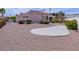 Charming single-story home featuring a landscaped front yard with desert landscaping and a tiled roof at 10720 Bennington Ct, Las Vegas, NV 89134