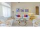 Cozy living room with comfortable seating, stylish decor, and lots of natural light at 10720 Bennington Ct, Las Vegas, NV 89134
