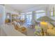 Open-concept living area with backyard access and dining room beyond at 10720 Bennington Ct, Las Vegas, NV 89134