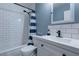 Bright bathroom featuring subway tile surround and black fixtures at 117 Saint Albans Ct, Henderson, NV 89015
