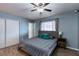 Inviting bedroom with neutral walls, natural light, and vinyl flooring at 117 Saint Albans Ct, Henderson, NV 89015