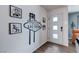Unique entryway featuring Las Vegas themed artwork and a modern front door at 117 Saint Albans Ct, Henderson, NV 89015