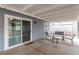 Relaxing covered patio area with access to the backyard at 117 Saint Albans Ct, Henderson, NV 89015