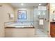 Bathroom includes a tub and glass shower at 135 E Harmon Ave # 3704, Las Vegas, NV 89109