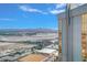 Expansive city views overlooking the airport and mountains from this high-rise condo building at 135 E Harmon Ave # 3704, Las Vegas, NV 89109