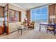 Cozy living space with comfortable seating, stylish decor, and expansive city views at 135 E Harmon Ave # 3704, Las Vegas, NV 89109