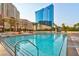 Outdoor pool with seating at 135 E Harmon Ave # 3704, Las Vegas, NV 89109