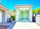 Spacious three-car garage or workshop space with bright lighting, a roll-up door, and ample room for vehicles or projects at 1601 Fairgate Ct, Las Vegas, NV 89117