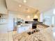 Spacious kitchen features granite counters, stainless steel appliances, and recessed lighting at 1601 Fairgate Ct, Las Vegas, NV 89117