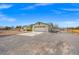 Spacious single-story home with a two-car garage, large driveway, and fenced yard at 1720 S Blagg Rd, Pahrump, NV 89048