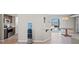 View of open concept kitchen and dining area with modern appliances and abundant natural light at 1720 S Blagg Rd, Pahrump, NV 89048