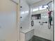 Beautiful new shower with marble-look tile and black accents at 2136 Eagle Sticks Dr. Dr, Henderson, NV 89012