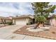 Charming single-story home featuring a well-manicured front yard with mature trees and low-maintenance landscaping at 2136 Eagle Sticks Dr. Dr, Henderson, NV 89012