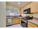 Charming kitchen features stainless steel appliances and granite countertops at 2136 Eagle Sticks Dr. Dr, Henderson, NV 89012