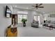 Spacious living room with vaulted ceilings, a ceiling fan, and lots of natural light at 2136 Eagle Sticks Dr. Dr, Henderson, NV 89012