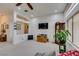 Inviting living room with vaulted ceilings, a wall-mounted TV, and easy access to the kitchen and other living areas at 2136 Eagle Sticks Dr. Dr, Henderson, NV 89012