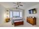 Comfortable bedroom with vaulted ceilings, ceiling fan, and bay windows at 2136 Eagle Sticks Dr. Dr, Henderson, NV 89012